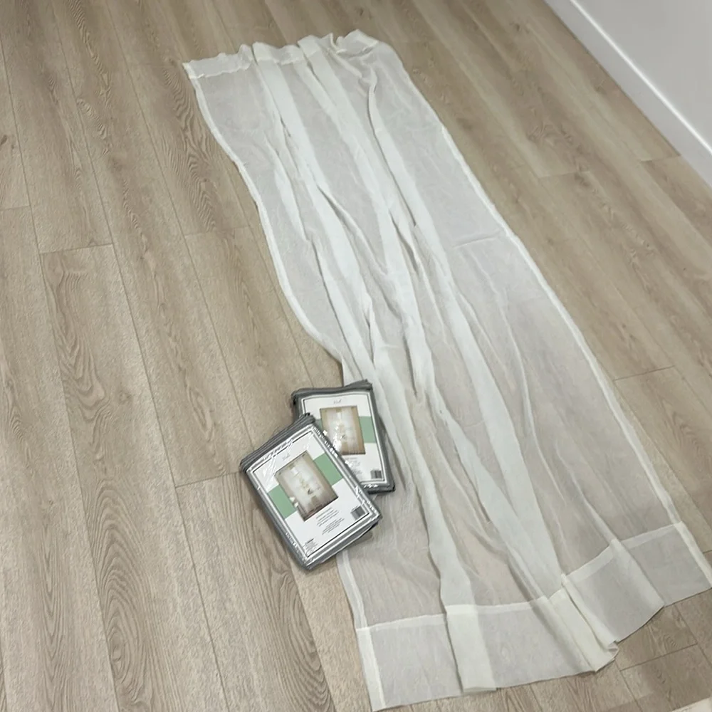 Cream textured fabric curtains